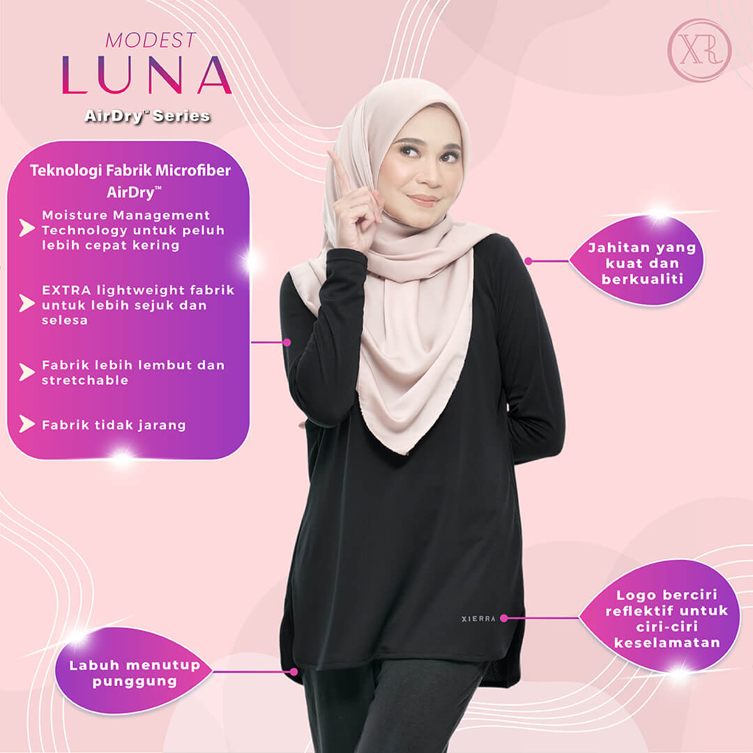 A woman wearing a black colored modest activewear top, peach colored hijab and black pants.